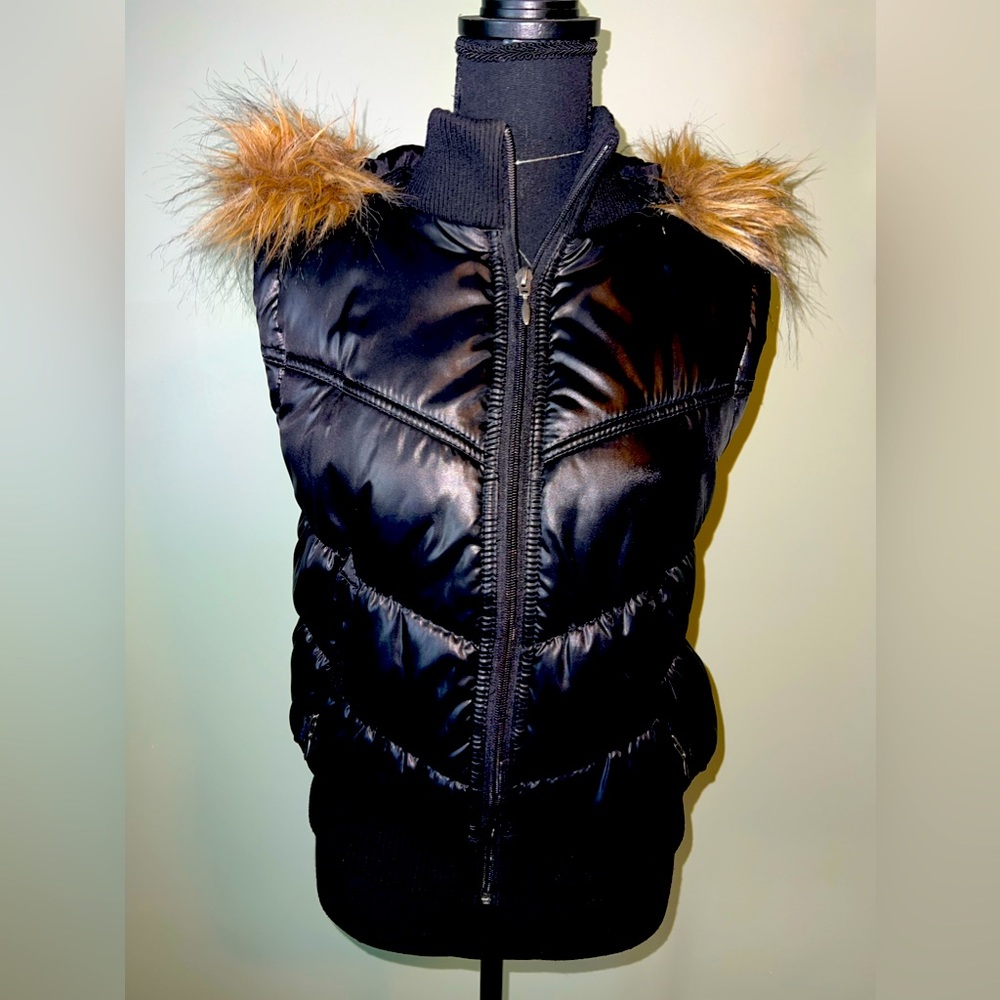 Vest with faux fur hood.